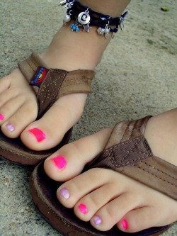 the-foot-archivist:  The smell of the Rainbow flip flops and mega cute toes are making my cock swell.