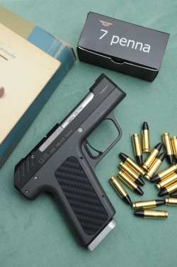 cerebralzero:  negative-corpus:  Can anyone tell me more about this firearm? Its a Q.S. 7penna  That cartridge is crazy, looks even longer than .38 super
