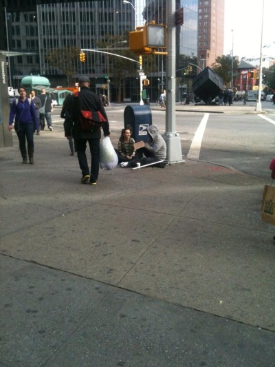 This girl just decided to sit next to a homeless man and they just chilled out for a while.