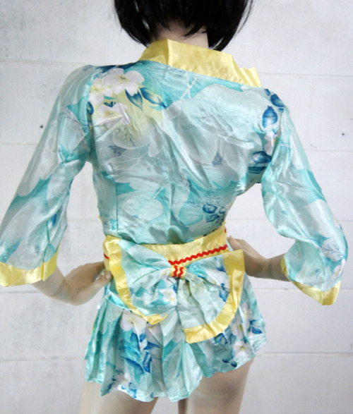 Yellow/Blue/White KimonoBlue floral print with yellow trim kimono.Check out this item and more on 62