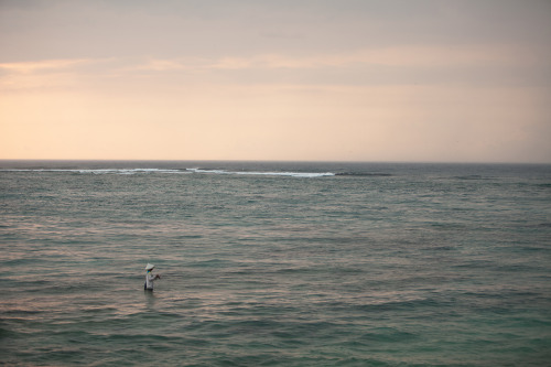 A fisherman at Senggigi Beach Lombok, Indonesia