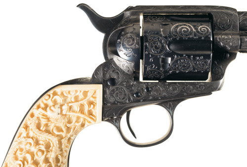 Engraved and gold inlaid Colt Model 1873 Single Action Army with carved ivory grips, circa 1901.