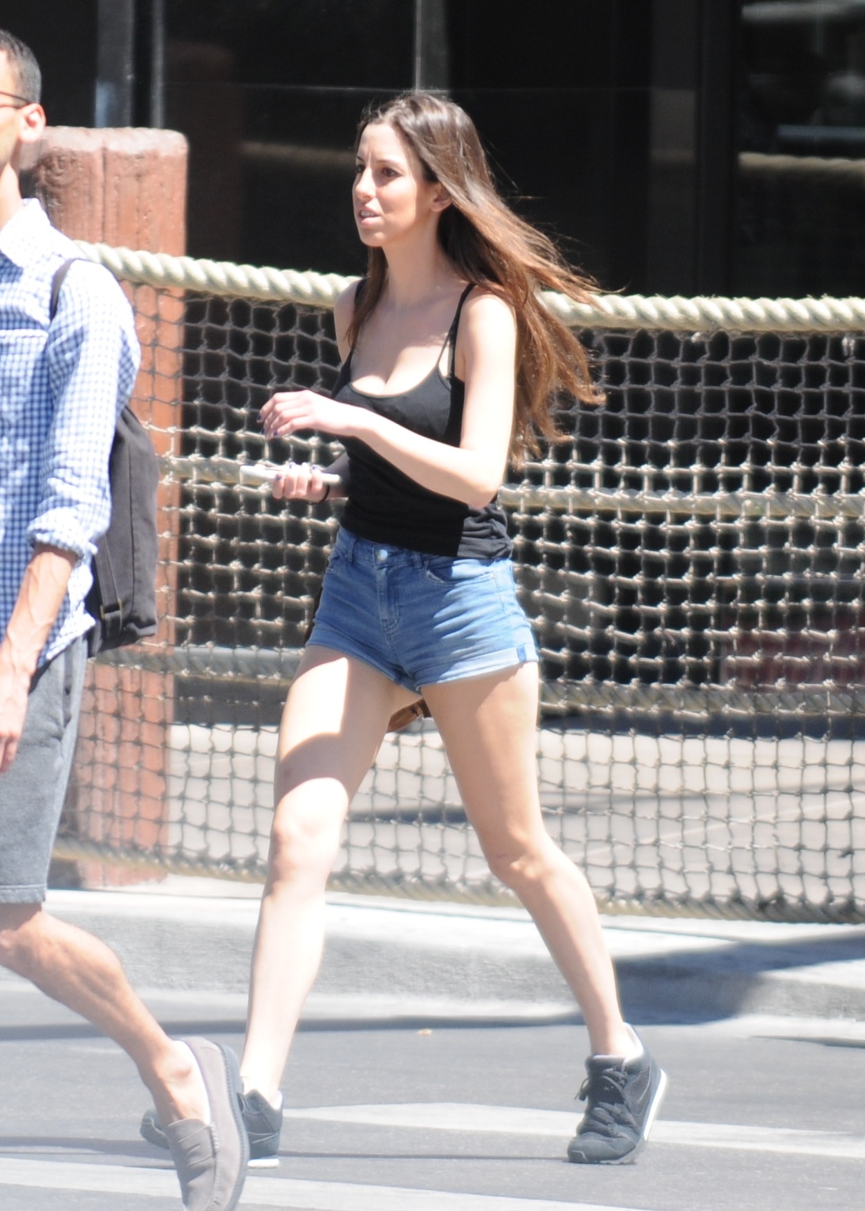 You can see more of her butt from the front then you can from the back.