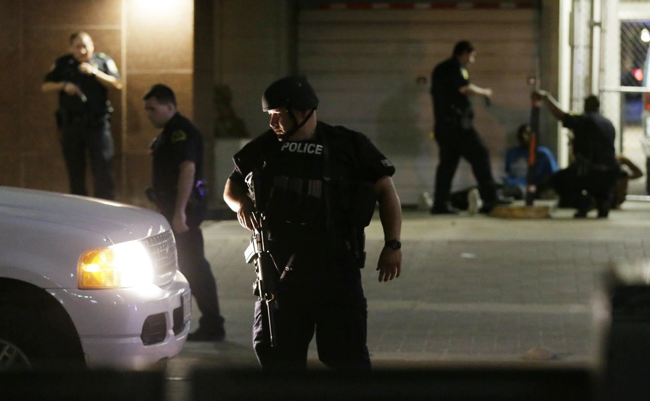 verdigris113:  Police Officers in Dallas bravely secure the city in the wake of a