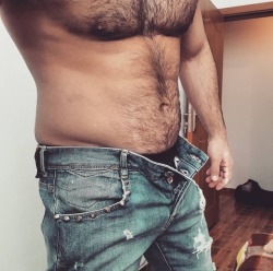 Pecs, fur and denim.