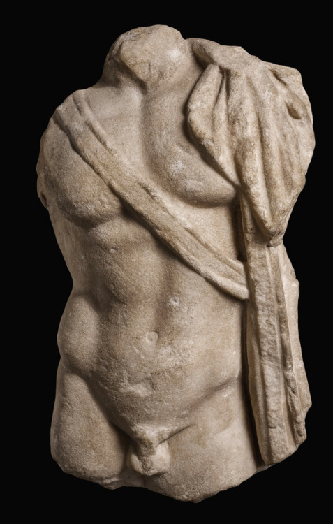 A Roman Marble Sarcophagus Relief Torso of a Young Warrior, Eastern Mediterranean, 1st half of the 3