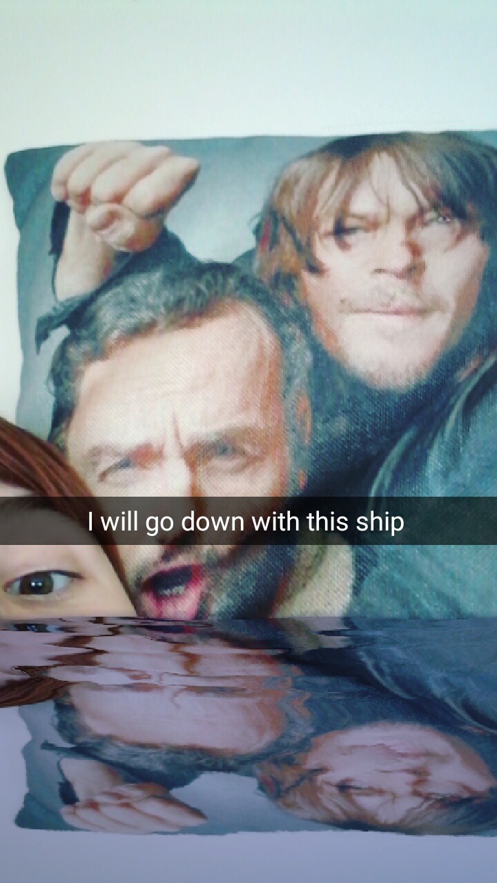 My sister gave me this pillow with Andrew Lincoln and Norman Reedus and I was playing on Snapchat and…