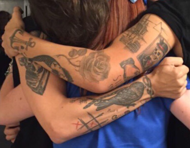 Harry & Louis 💚💙 — Can you explain the tattoos that 