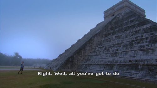 wenchyfloozymoo: Karl explaining how to play a DVD to Suzanne while at the Chichen Itza.