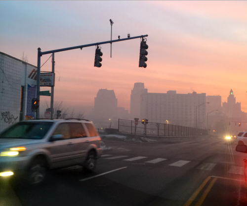 gradientgod:An abandoned factory burned down last night and this morning the city was still in smoke