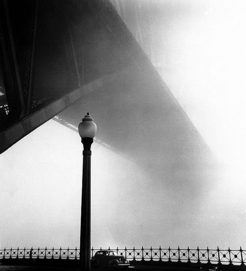 Max Dupain. Morning Mist. Sydney Harbour Bridge from Millers Point, 1950s.