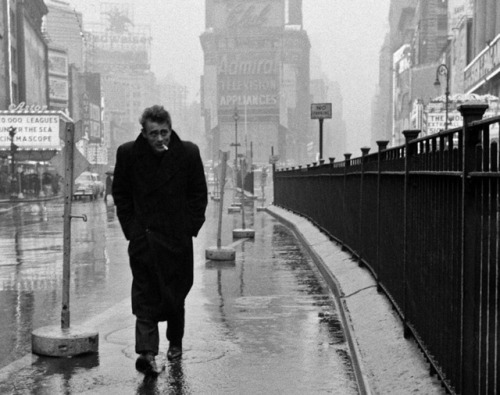 50sbabyy: James Dean, portrait by Dennis Stock in Times Square. 1955