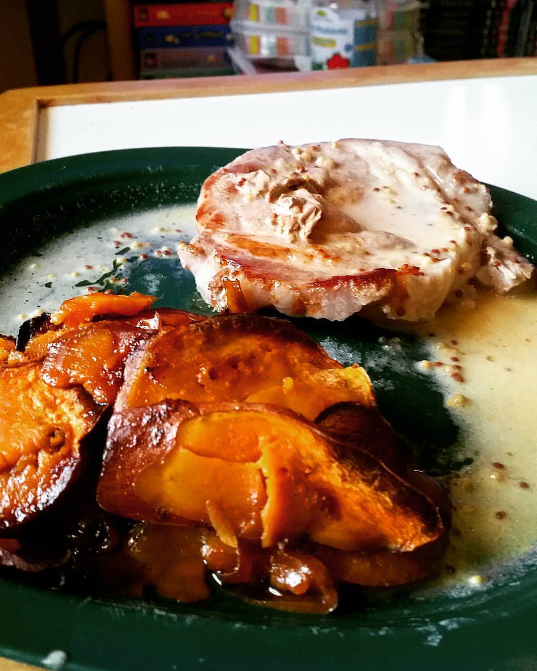 Perfectly cooked pork steaks with cider mustard sauce and Sweet potato Boulangére.