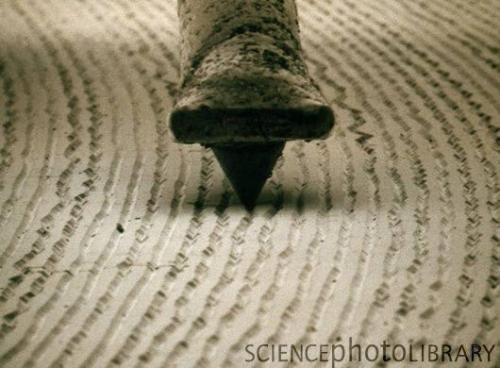 The grooves on an LP (with record stylus) as seen through an electron microscope.(via twitte