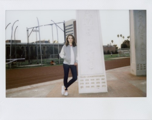 americanapparel:  Elena wearing the Unisex Wool Club Jacket With Leather Sleeves, Unisex Poly-Cotton ¾ Sleeve Raglan Shirt, NEW Stretch Denim Pencil Pant and Unisex Tennis Shoe 