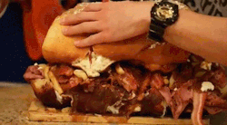 digg:  Kevin Smith eating a sandwich named “the burly beaver” on Epic Meal Time. 