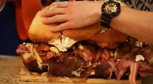 digg:  Kevin Smith eating a sandwich named “the burly beaver” on Epic Meal Time. 