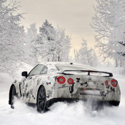 thinkingbeyondborders:  Nissan Skyline GT-R R35 with camo pain job snow drifting.