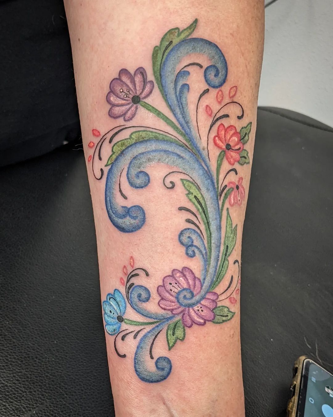 My Norwegian Rosemaling tattoo done by Gillian at Asylum Tattoo in Roanoke,  VA. So thrilled by her shading! Also bonus tattoo she did for me (hint, I  was born with the dots) :