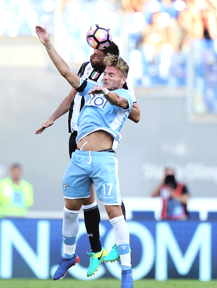 Ciro Immobile and Andrea Barzagli in S.S. Lazio vs Juventus