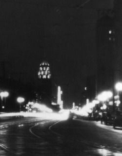 losangelespast:  A moody, soft-focus view down Hollywood Boulevard, night, 1930. 