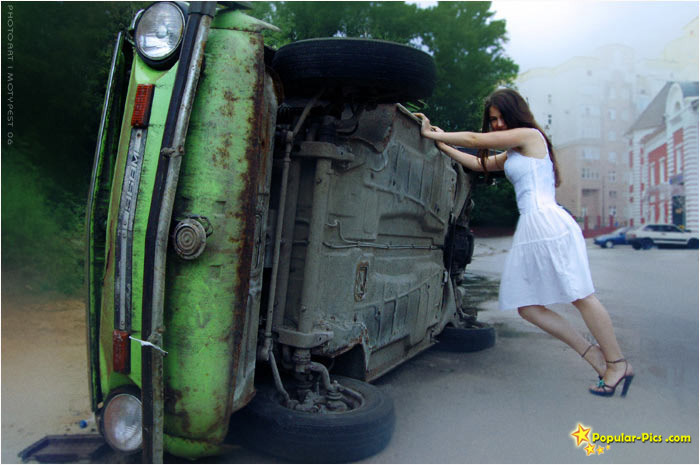 She flips that car as easily as a toy !