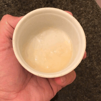 Cup full of 6 loads of Cum, what faggot wants it in their loose hole?