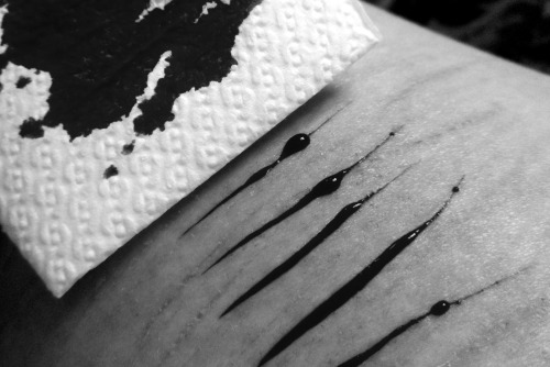 slippedintomycoffee:  (Photo—reblogged: words—L.A. Hunter) Tiny red dots bead on the surface of my skin and the angry line along my arm begins to nip at the site of them.  My breathing is steady as I create another line parallel to the first and