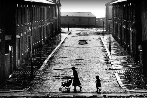 flashofgod:Denis Thorpe, Street of terraced houses awaiting demolition, Salford, 1979.