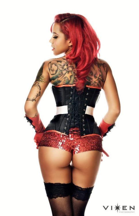 inkedgirls:Elle Audra Dabney Photograph by Vixen Photography. Corset by Black Filigree Couture. Hair