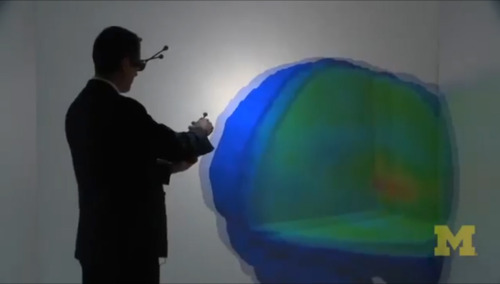 Hologram-like 3-D brain helps researchers decode migraine pain
Wielding a joystick and wearing special glasses, pain researcher Alexandre DaSilva rotates and slices apart a large, colorful, 3-D brain floating in space before him.
Despite the white...