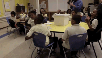 micdotcom:  Watch: Michelle Obama surprised some elementary school kids and it was