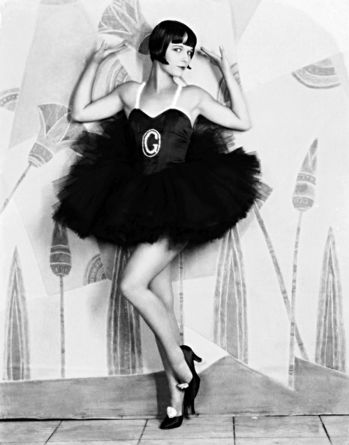 onlyoldphotography:  Eugene Robert Richee: Louise Brooks wearing a frilly dress with a large G on the front for the film “Now We’re In The Air”, 1927 