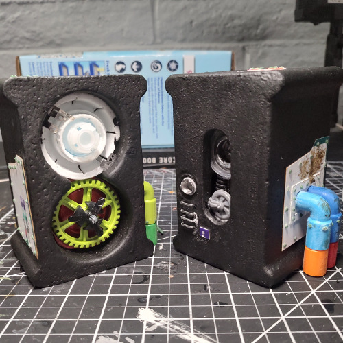 bfleuter: Some sci-fi industrial terrain I made from trash and toy parts.