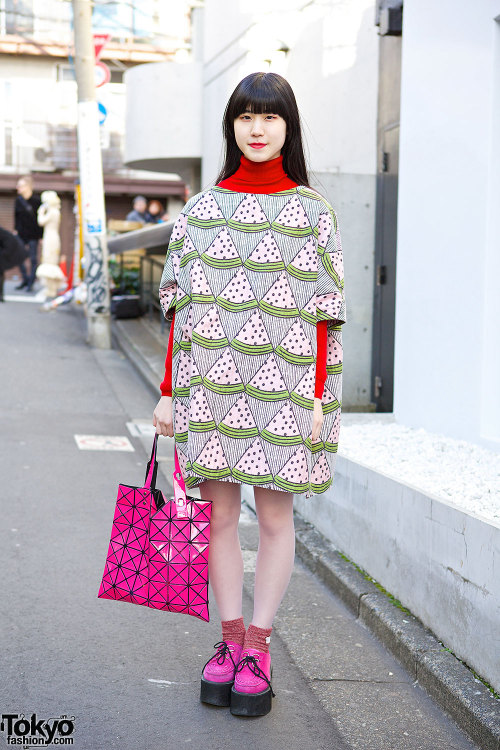 18-year-old Nori on the street in Harajuku wearing an I Am I watermelon print dress with pink Nadia 