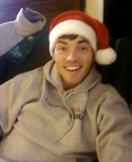 @AnnaBanks: He is so adorable in his Santa hat. #SexySanta