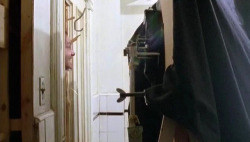 the-overlook-hotel:  Filming jack Nicholson’s iconic “Here’s Johnny!” moment on the set of The Shining. The camera has been heavily protected from Jack’s axe and the debris which resulted from hacking open the door. 