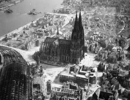 collectivehistory:The Cologne cathedral stands tall amidst the ruins of the city after Allied bombin