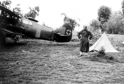 Slovak Pilot next to an Avia B-534 of the Slovak Air Force on an airfield in Ukraine, eastern front.