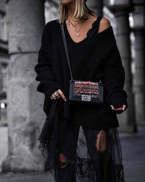 Black elegance with Chanel bag.