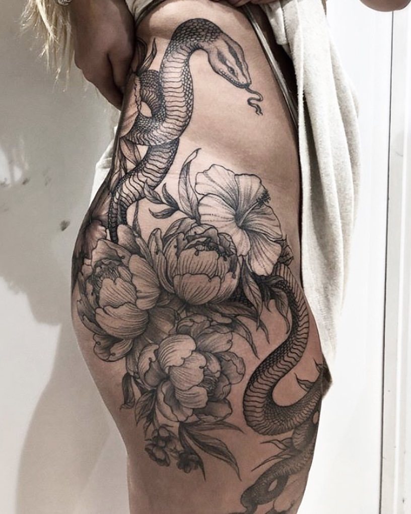 Two Faced Tattoo  A pretty peony hip and thigh piece done is a simplistic  style black and grey  Facebook