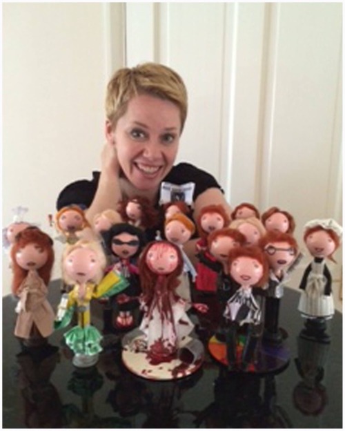 The fantastic Linzi Hateley with her commissioned full set of dolls of her various and varied west e