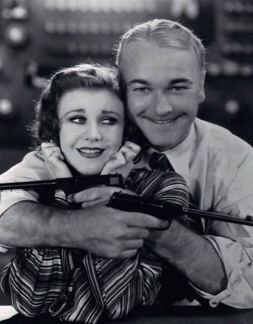 Ginger Rogers gets cozy with William Boyd in Suicide Fleet (1931).