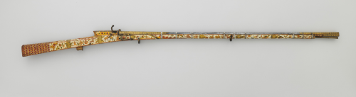 A magnificently decorated matchlock rifle originating from India, 18th century.  Note the square bor