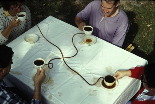jpegheaven:
Allan Wexler.
Coffee Seeks Its Own Level. 1990. If one person alone lifts his cup, coffee overflows the other three cups. All four people need to coordinate their actions and lift simultaneously. Inspired by the principle “water seeks its own level”. I had been working on a series of projects using basic scientific principles learned in high school as a means to explore architectural issues.     