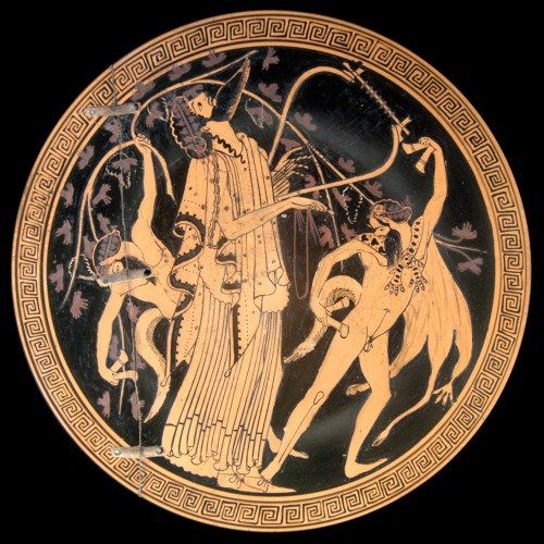 Dionysus, flanked by sileni (or satyrs).  Interior of an Attic red-figure cup, attributed to the Bry