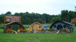 chazzam:  omg this company makes fucking Hobbit Holes in various sizes that can be chicken coops, playhouses, sheds, and even actual, functioning tiny houses! The fucking company is IN MAINE where I LIVE RIGHT NOW and I can go there and see them and I