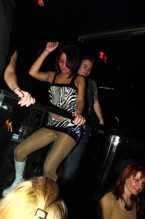 Short dress and sheer pantyhose for this dancing girl.Woman in pantyhose