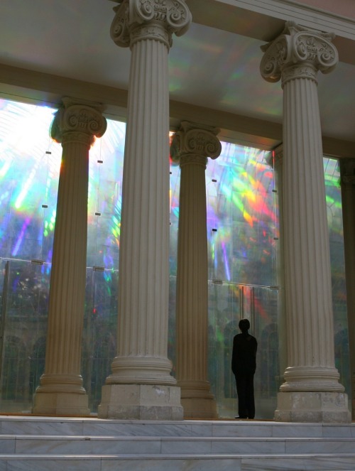 sunfl0werpetal:  cubebreaker:  Artist Kimsooja transformed the Palacio de Cristal into a heavenly dreamworld using translucent diffraction film on the windows to create a rainbow effect which reflected off the mirrored floor.  I believe in the good things