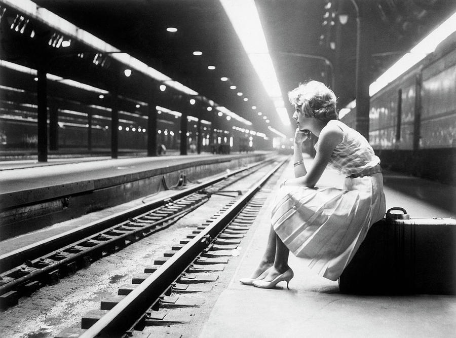 undr: Bettmann. Teenage Girl Waiting For Train. 1960s